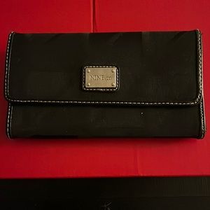 Black tri fold wallet.